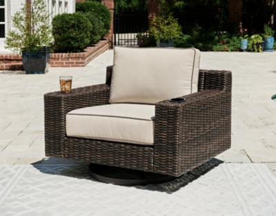 Ashley Coastline Bay Brown Outdoor Swivel Lounge with Cushion
