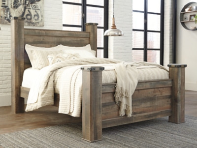 Ashley Trinell Brown Queen Poster Bed