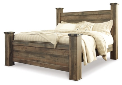Trinell Brown King Poster Bed with Dresser, Chest and Nightstand