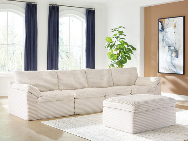 Ashley Canefield Ivory 4-Piece Sectional with Ottoman