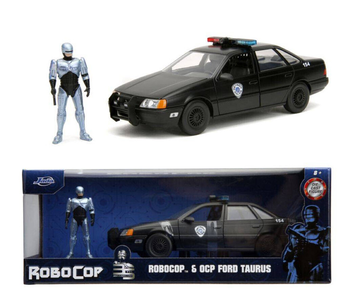 Macheta 1/24 1986 Ford Tarus cu figurina  RoboCop , black/silver - Imagine 1