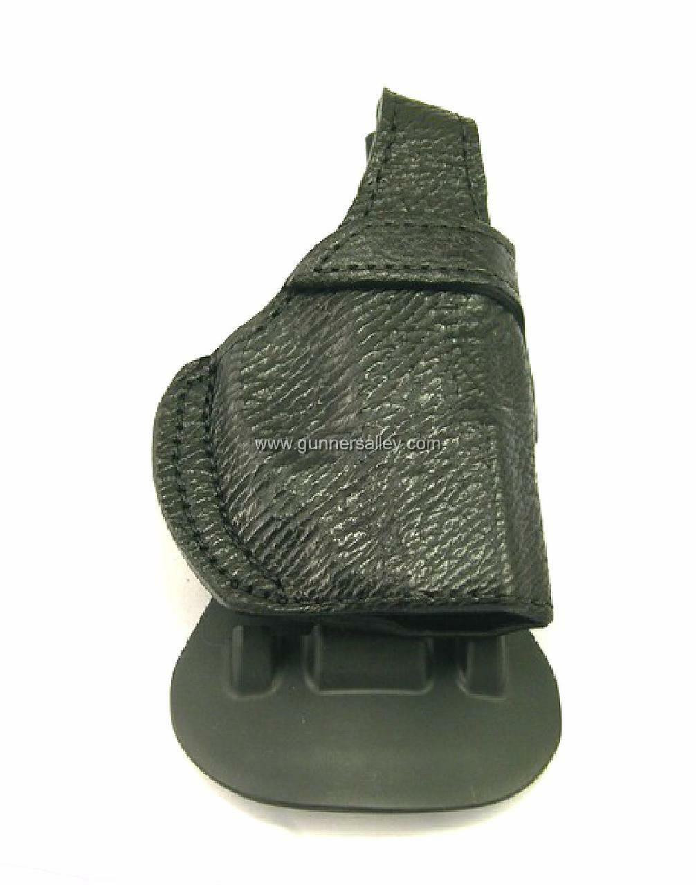 Paddle holster for Ruger LC9 shown in OPTIONAL Full Black Tiger shark with OPTIONAL thumb break