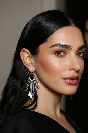 Boho Silver Metal Fringe Paddle Earrings worn by our model. Boho Silver Metal Fringe Paddle Earrings worn by our model.