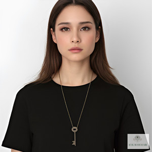 Model in black t-shirt wearing Vintage Key Necklace on Ball Chain Model in black t-shirt wearing Vintage Key Necklace on Ball Chain