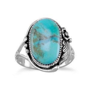 Oval Reconstituted Turquoise Floral Design Ring Oval Reconstituted Turquoise Floral Design Ring