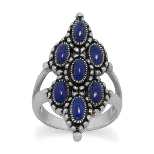 Oxidized sterling silver ring with ornate marquis shape front and 7 individual 2.3mm x 5.7mm lapis stones. The band near the stone is split and merges into one band that measures approximately 3.3mm in the back. This ring is available in whole sizes 6-10.
.925 Sterling Silver