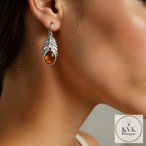 Oxidized Amber Feather Earrings worn by model