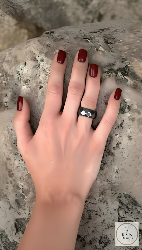 6mm Faceted Hematite Ring worn on model wearing red nailpolish