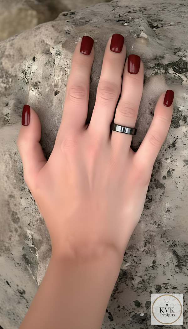 6mm Magnetic Hematite Flat Ring worn by model wearing red nail polish