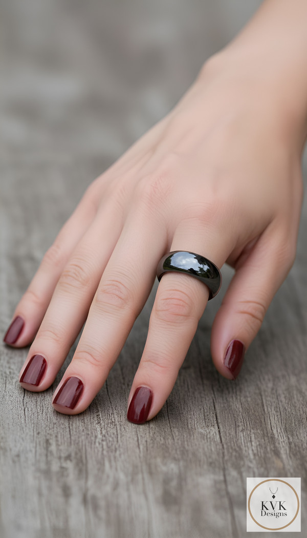 10mm Dome Magnetic Hematite Rings worn by model with red nail polish