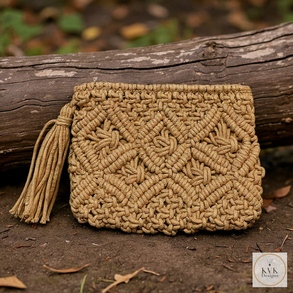 Tan Macramé Clutch Bag leaning against a log outside