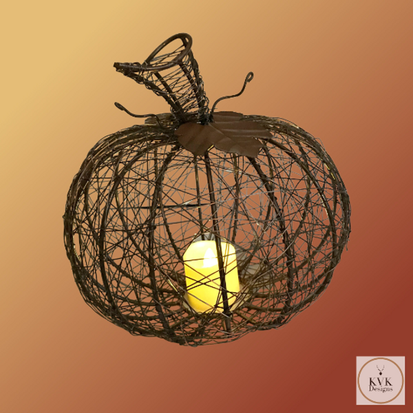 Wire Wrapped Fall Pumpkin with candle. 