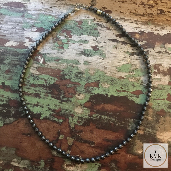 Faceted Hematite Bead Necklace on distressed farm table