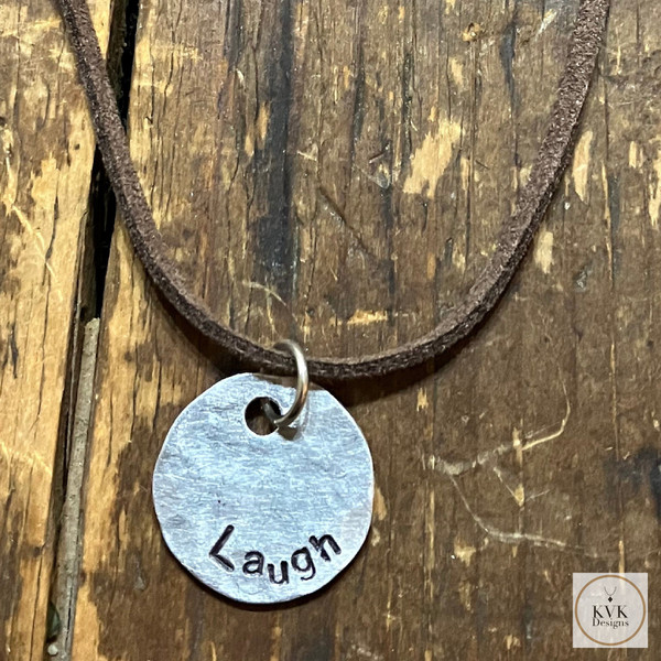 Silver Hammered Disc Pendant Necklace with 'LAUGH' Stamping