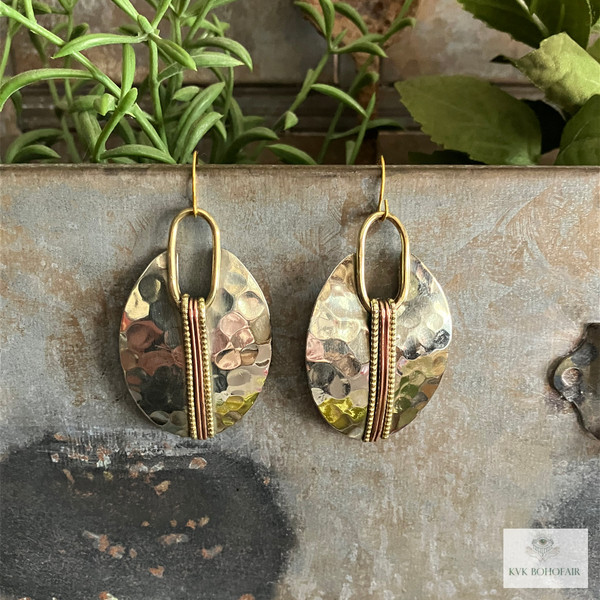 Mixed Metal Silver Oval Earrings - Boho Earrings hanging from a metal box