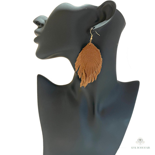 Boho Handcrafted Suede Feather Dangle Earrings worn by mannequin