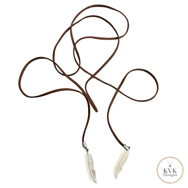 Boho Chic: Brown Suede Lariat Feather Necklace on white background