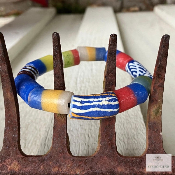 Handcrafted African Trade Bead Bracelet on an antique rake