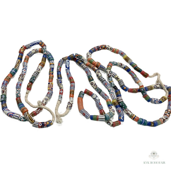 A group of Long African Trade Bead Necklaces on a white background