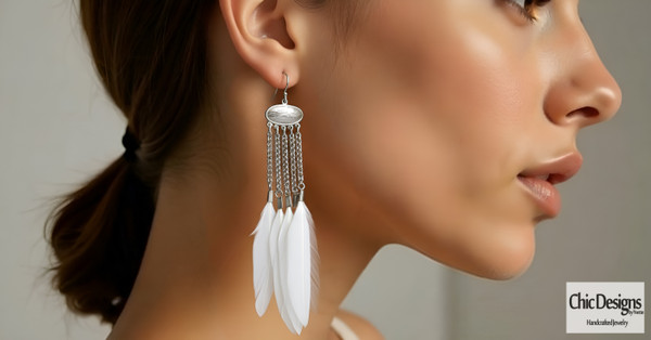 Brass and Feather Chandelier Earrings white feather chandelier earrings on model
