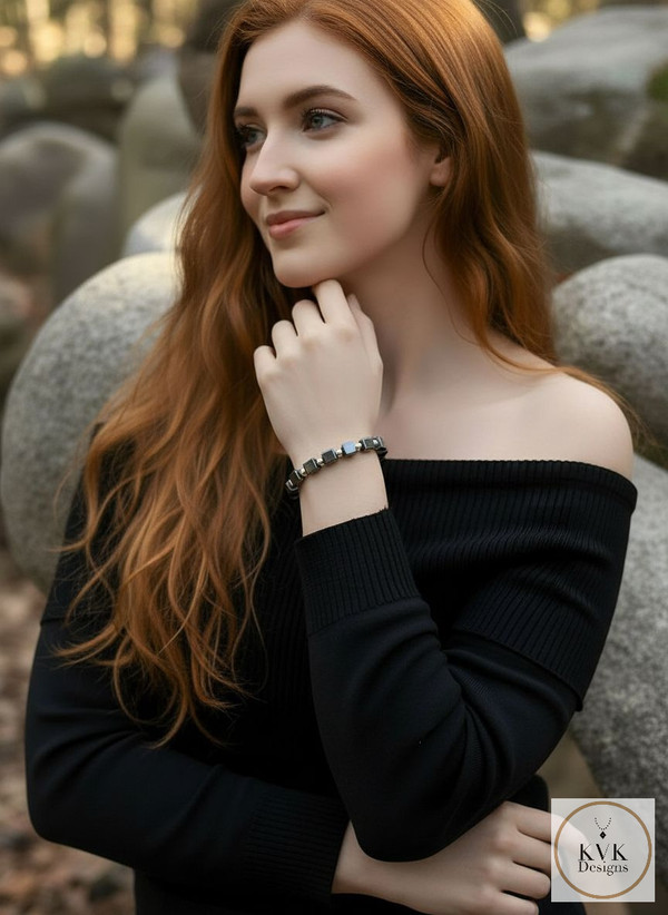 Hematite Cube Silver Bead Bracelet worn on model wearing black off the shoulder sweater