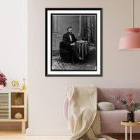 Ulysses S. Grant, full-length portrait, seated at table with books and top hat, facing right, Antique Poster