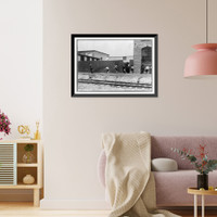 Historic Framed Print, Noon hour at Priscilla Knitting Mills, Meridian, Miss. Small Boy works. Location: Meridian, Mississippi.,  17-7/8" x 21-7/8"