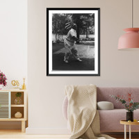 Historic Framed Print, [Hermann Goering playing tennis in garden of villa],  17-7/8" x 21-7/8"