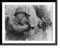 Vintage Military Print - Waffen SS soldier standing against a wall