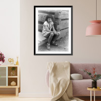 Historic Framed Print, [Small girl seated by log cabin, no. 1],  17-7/8" x 21-7/8"