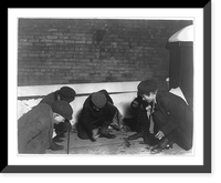 The same group (see #1289.) playing craps in the jail alley at 10 P.M. Location: Albany, New York (State), Historic Reproduction