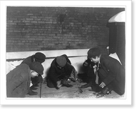 The same group (see #1289.) playing craps in the jail alley at 10 P.M. Location: Albany, New York (State), Historic Reproduction
