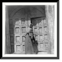 Mexican-Americans in Southwestern U.S., 1901?: woman opening carved wooden church door, Historic Print