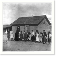 Mexican-Americans in Southwestern U.S., 1901?: girls in front of schoolhouse, Historic Reproduction