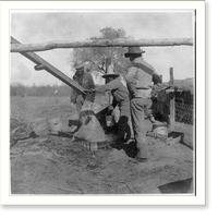 Mexican-Americans in Southwest U.S., 1901(?): 3 men working at mill(?), Historic Print