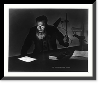 Wilhelm Konrad Roentgen, 1845-1923 (actor posing as Roentgen?); half, seated, experimenting with lamp Classic, Antique Poster