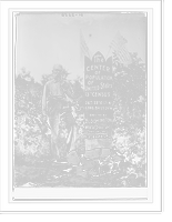 Historic Framed Print, The Center of Population of U.S. man standing next to memorial stone,  17-7/8" x 21-7/8"