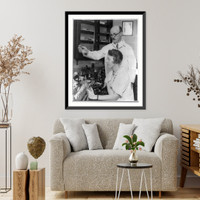 Harry Oakes, three-quarter length portrait, standing, with wife, in laboratory with microscope and test tubes, Antique Poster