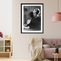 Lucila Godoy Alcayaga, 1889-1957, half-length portrait, seated, reading, facing left, Historic Reproduction