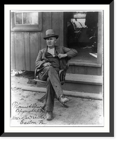 Historic Framed Print, [Thomas Alva Edison, 1847-1931, full-length portrait, seated in swivel chair outside office, facing left],  17-7/8" x 21-7/8"