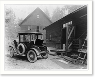 Historic Framed Print, [Charging the battery of a Detroit electric automobile],  17-7/8" x 21-7/8"
