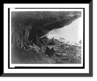 Man seated beneath rock formation at the Upper Yosemite Fall, Yosemite National Park, Calif, Vintage Print