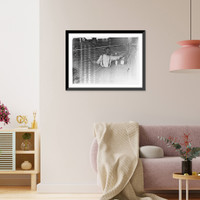 Historic Framed Print, Warper at his machine, Newton, N.C. Location: Newton, North Carolina.,  17-7/8" x 21-7/8"