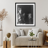 Historic Framed Print, [Kahlil Gibran in Middle Eastern(?) costume with leopard skin and staff, seated],  17-7/8" x 21-7/8"