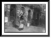 Historic Framed Print, Tired woman with heavy load of home-work. Lafayette St., near Astor Place. Location: New York, New York (State),  17-7/8" x 21-7/8"