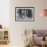 Historic Framed Print, Tired woman with heavy load of home-work. Lafayette St., near Astor Place. Location: New York, New York (State),  17-7/8" x 21-7/8"