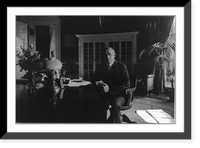 Historic Framed Print, [Woodrow Wilson, 1856-1924, three-quarters length, seated, facing slightly left, at desk in White House],  17-7/8" x 21-7/8"