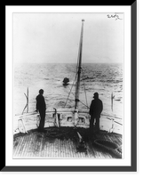 Historic Framed Print, [Coast Guard Cutter, USS Seneca chasing and capturing a rum runner" 1924: view from stern; rum runner in tow]",  17-7/8" x 21-7/8"
