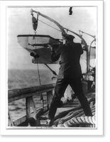 Historic Framed Print, [Coast Guard Cutter, USS Seneca chasing and capturing a rum runner" 1924: Lt. L.W. Perkins firing at fleeing boat]",  17-7/8" x 21-7/8"