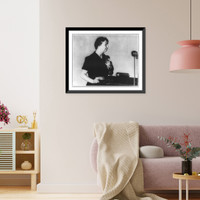 Eleanor Roosevelt, half length, facing right, standing before microphone, Antique Poster